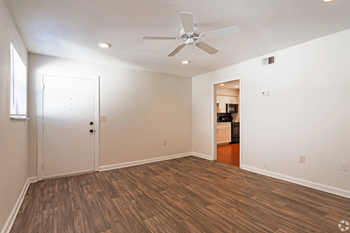 Living Area With Ceiling Fan Property Image
